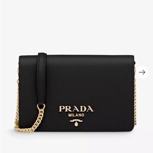 PRADA
Brand-plaque mini Saffiano-leather cross-body bag
